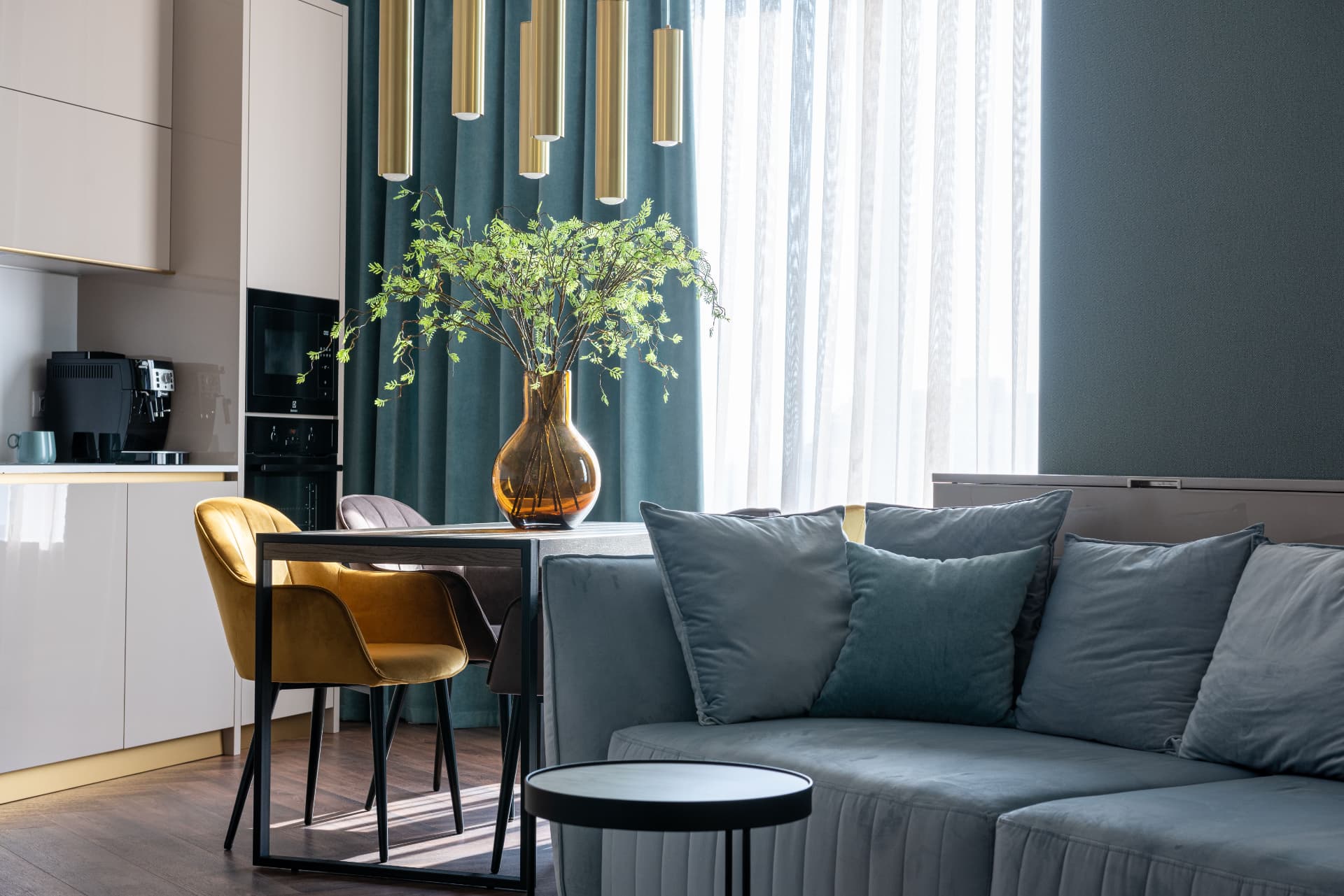 Bright open-plan living and dining space with a kitchen in a contemporary UK home
